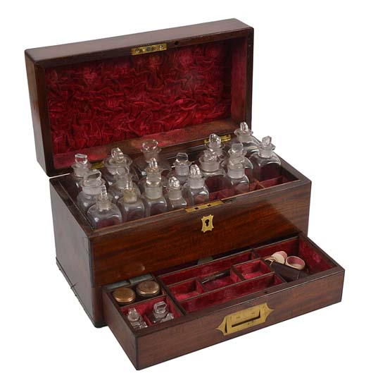 A good 19th century mahogany cased apothecaries` box, the top opening to reveal various glass