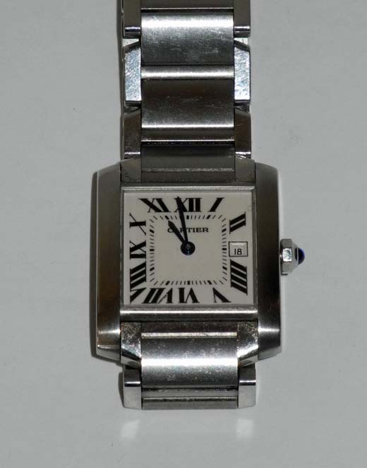 A mid-sized Cartier Tank Française wrist watch in stainless steel, with white Roman chapter dial and