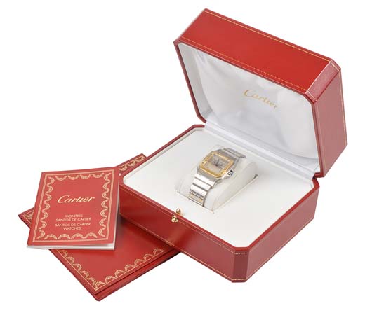 A mid-sized stainless steel and 18ct gold Cartier Santos dress watch, having a brushed metal date