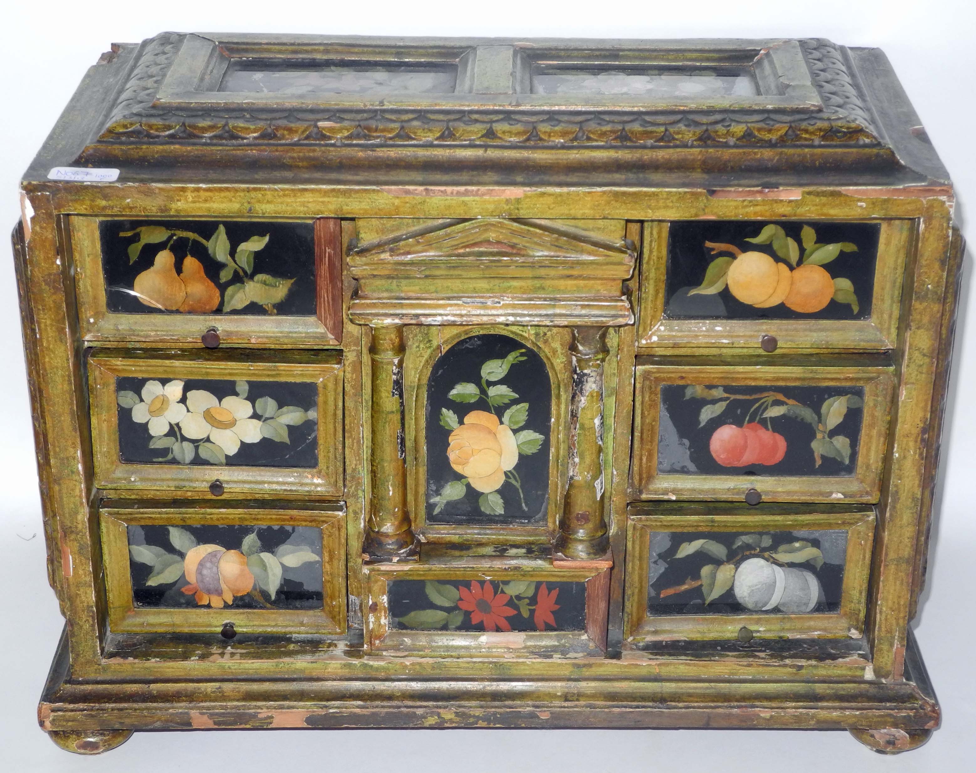An antique Italian table top cabinet, of architectural form and having a green polychromed finish,