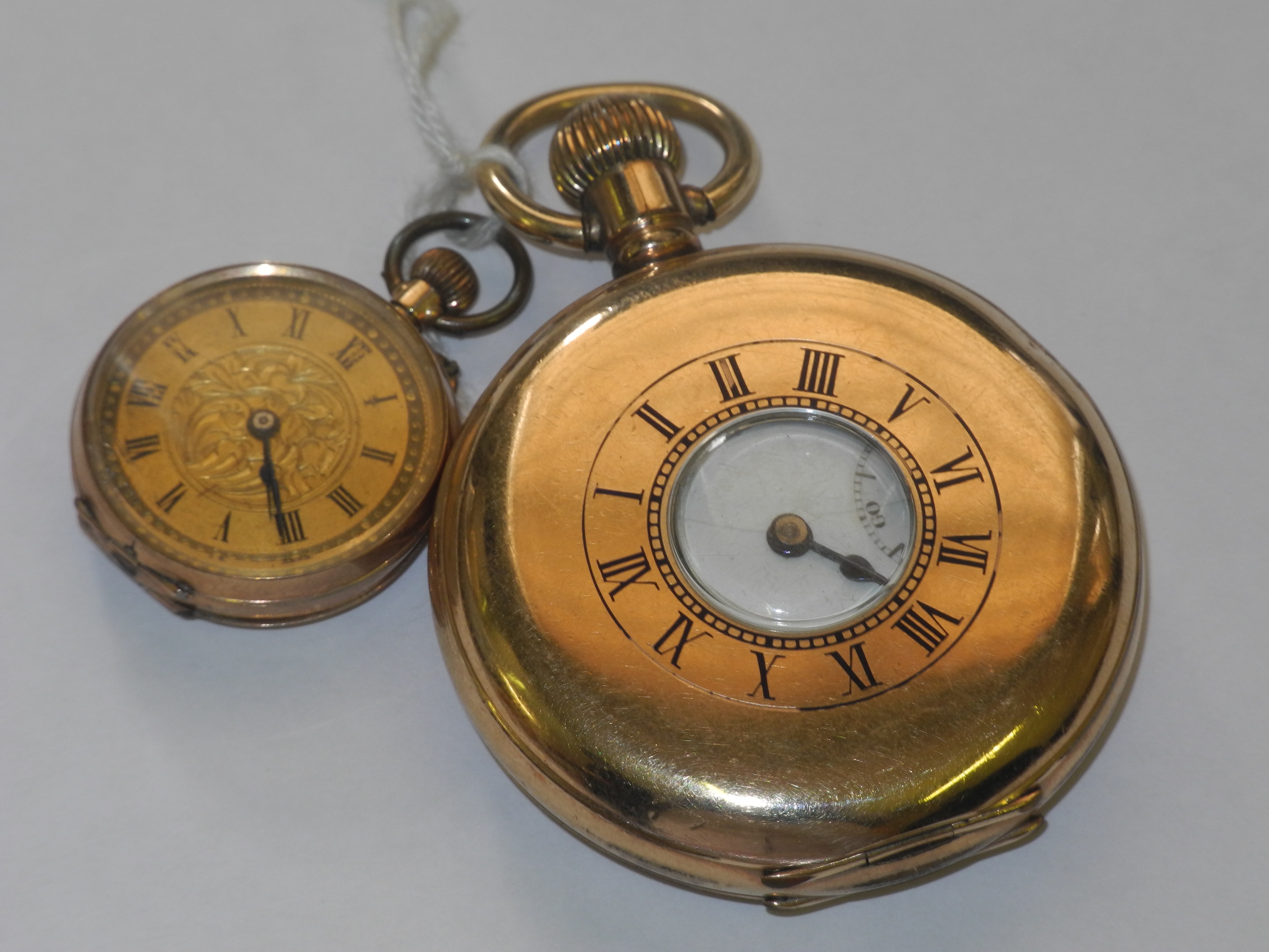 A late 19th century 9ct gold cased open faced fob watch, sold together with a vintage gold plated