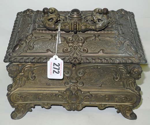A 19th century style bronzed table casket, with swing handle, scroll and mask decoration and lined