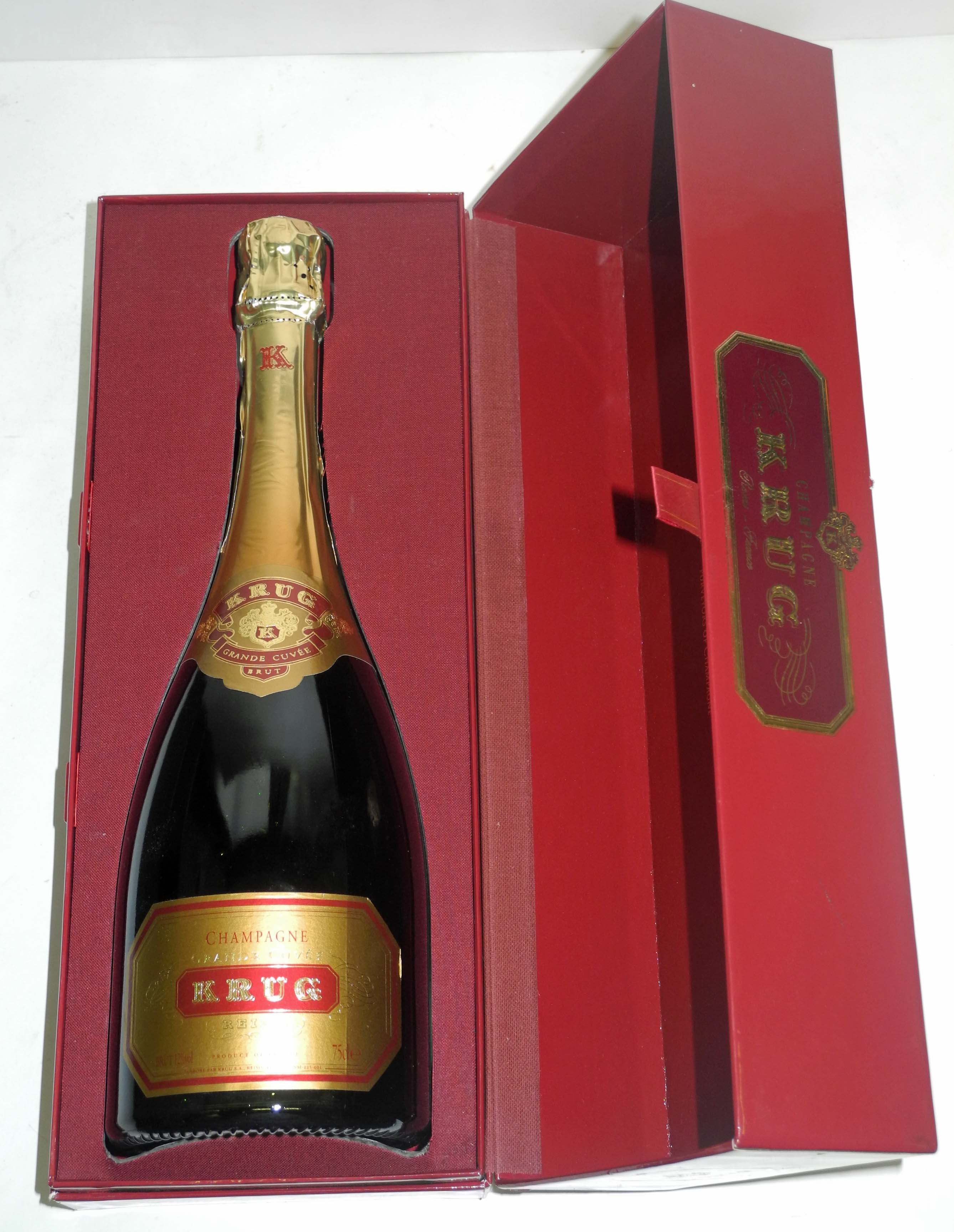 A bottle of Krug Grande Cuvée champagne, cased.