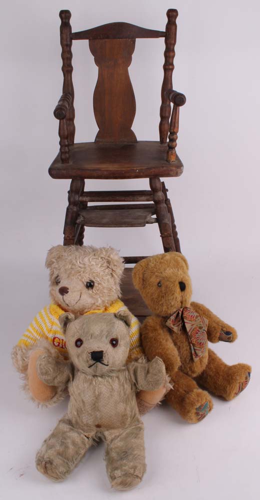 A 1900s doll`s wooden two level high chair, cot and later child`s chair with three Teddy bears (