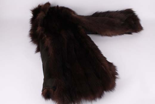A light brown mink bolero jacket labelled Fortnum and Mason, Piccadilly, London (silk lining has