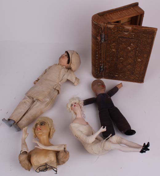 Two 1920s half dolls, an antique straw-covered box in the shape of a book with interior partitions