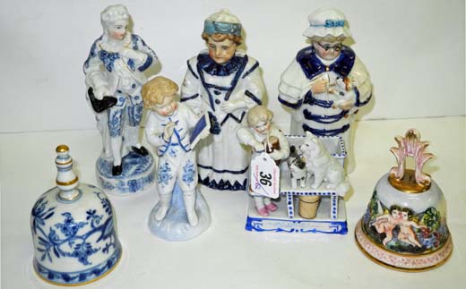 A large quantity of late 19th and early 20th century porcelain figurines, including a `couple in a