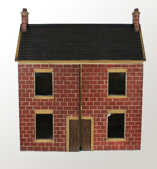 A Victorian wooden dolls' house, circa 1860, with painted brickwork exterior, black painted slate
