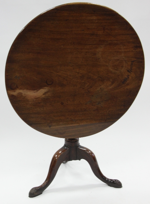 A George III mahogany supper table, the circular top on column support and tripod base, 81.5cm (32")