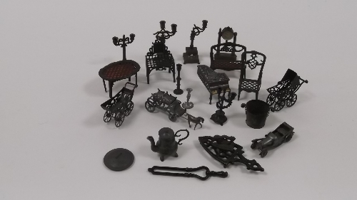 A quantity of alloy dolls' house furniture