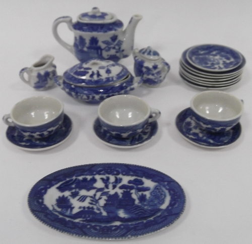 A dolls' Continental blue and white willow pattern tea service of twenty-one pieces