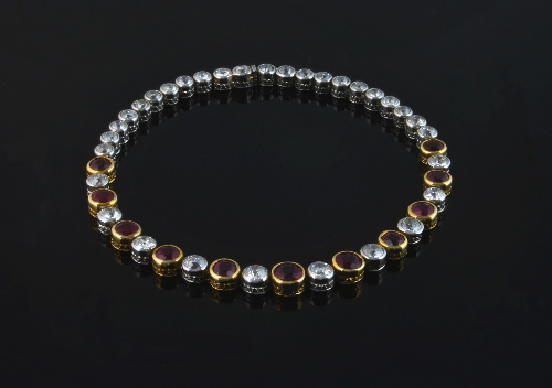 A French ruby and diamond line bracelet, circa 1920s, with alternating rubies and diamonds to the