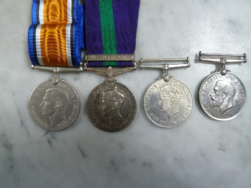 A George VI service medal, a service medal with Palestine 1945-1948 bar to 14615245 SIGMN J H