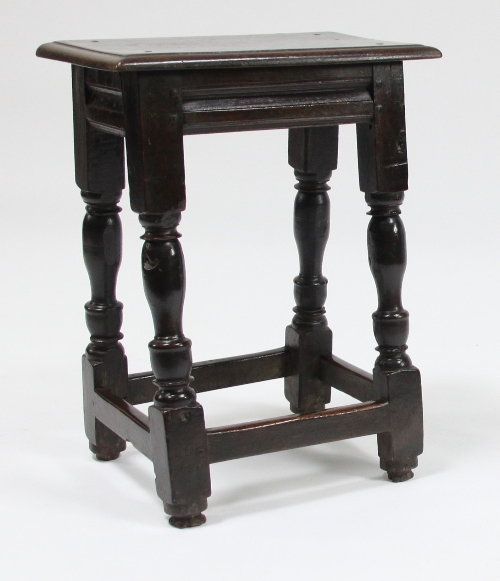 A 17th Century light oak joint stool, circa 1680, on turned legs joined by square stretchers