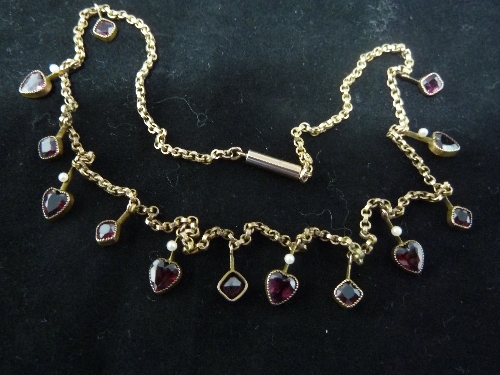 A pearl and garnet necklace, the 9ct gold chain hung with alternate heart shaped and square garnet