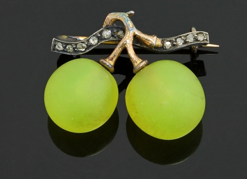 A diamond and frosted green glass bar brooch, modelled as grapes on a vine, attributed to Fonseque