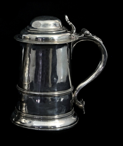 A George III silver tankard, Louis Black, London 1764, the domed cover with pierced thumbpiece,