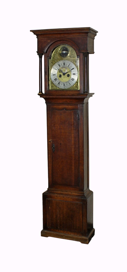 A late 18th Century eight-day longcase clock by Hariman, Workington, the oak case with turned