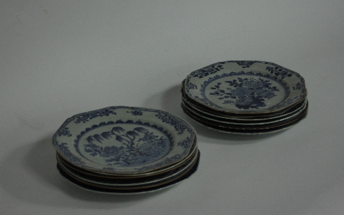 Twelve Chinese blue and white plates, Qianlong, painted variously with flowers in baskets, rocky