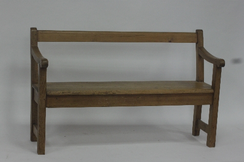A pine bench, 137cm (54”) wide and a pine tuck box