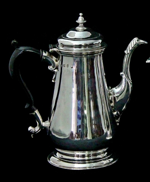 A George II silver coffee pot, Richard Bayley, London 1742, of baluster form with domed cover,