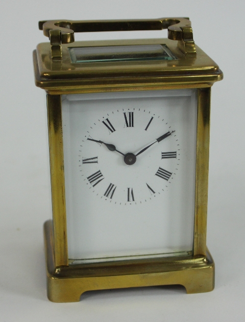 A gilt brass carriage timepiece, 15cm (6") high