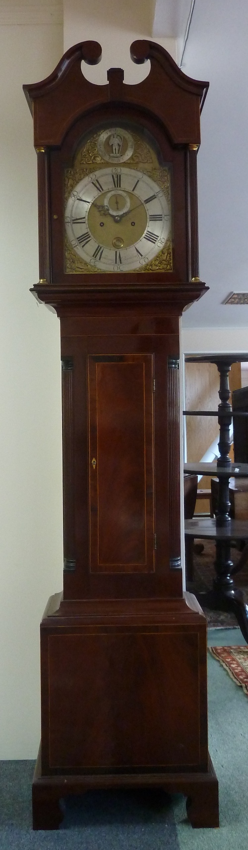 An 18th Century eight-day longcase clock by Thomas Beeching, Rye, the mahogany case with swan neck