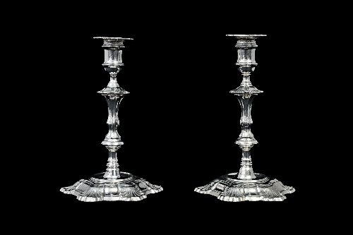 A pair of George II cast silver candlesticks, Simon Jouet, London 1750, of knopped form, the