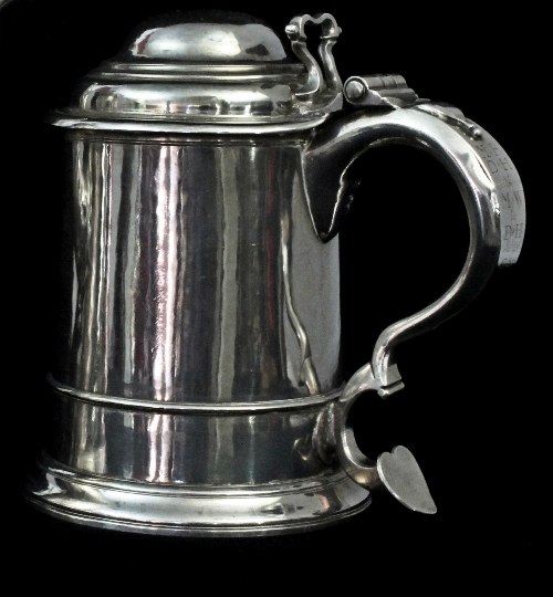 A George II silver tankard, Isaac Cookson, Newcastle 1732, with domed cover, open thumbpiece, scroll