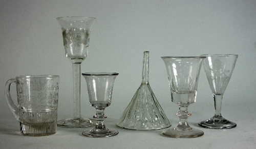 A cordial glass, the inverted bell-shaped bowl on an airtwist stem and circular foot with folded
