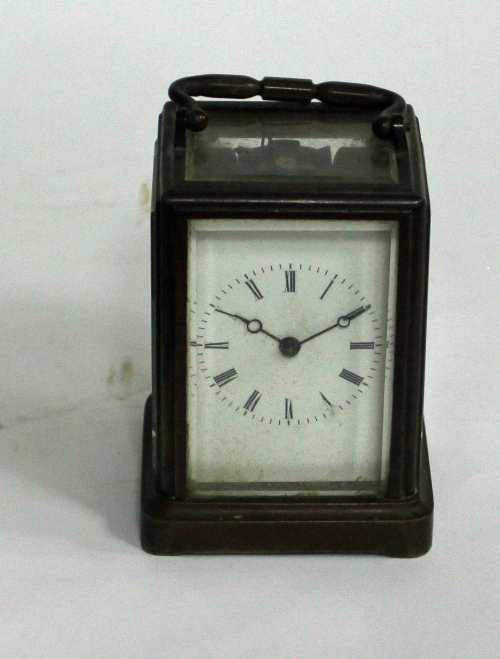 A brass carriage clock, fitted an eight-day striking movement, 13.5cm (5.25") high