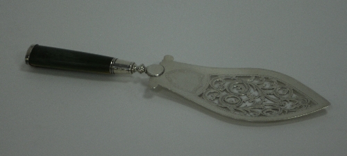 A George III silver fish slice, London 1792, with green stained ivory handle and pierced blade