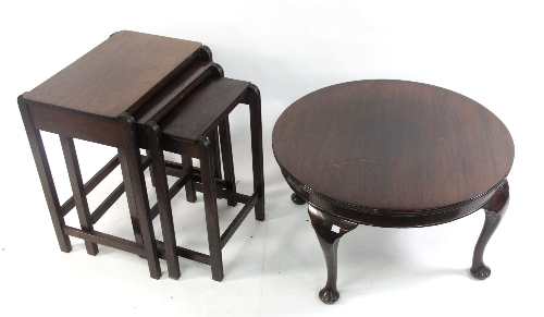 A nest of three  Art Deco Style mahogany tables, with curved reeded legs united by plain stretchers,