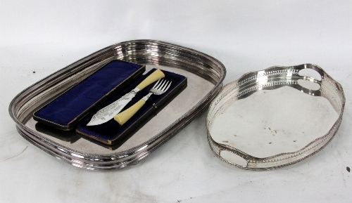 A silver plated tray, of rounded rectangular shape with gadroon rim, 57cm (22.5") wide, a plated