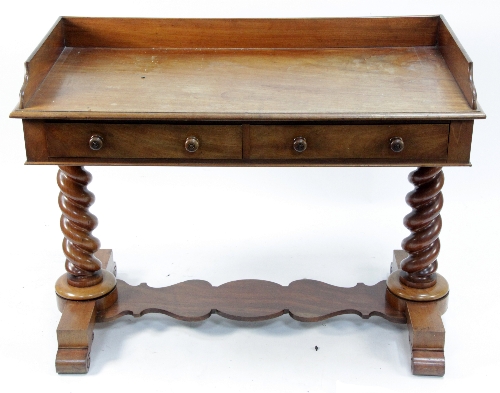 A Victorian mahogany washstand with three-quarter gallery, fitted two frieze drawers on spiral