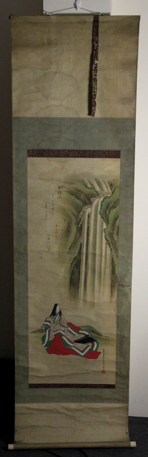 A Chinese wall hanging, woman seated beside a waterfall, 200cm x 45cm (78.5" x 17.75")