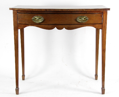 A George III bowfront side table, with single drawer on square tapering legs, 72.5cm x 78.75cm (28.