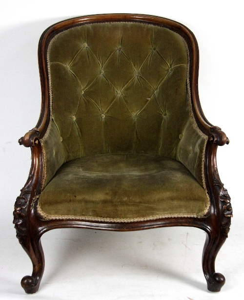 A Victorian walnut chair with arched back on twist turned supports and legs