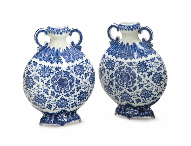 A PAIR OF SMALL CHINESE BLUE AND WHITE MOONFLASK-FORM WALL MOUNTS, 
each with apocryphal