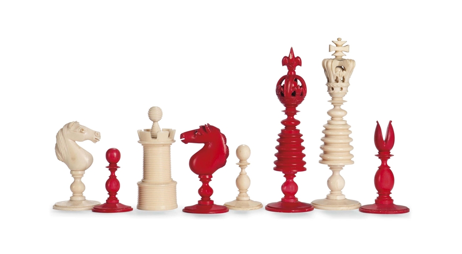 A VICTORIAN IVORY CHESS SET
POSSIBLY BY LUND, SECOND HALF 19TH CENTURY
The kings and queens with