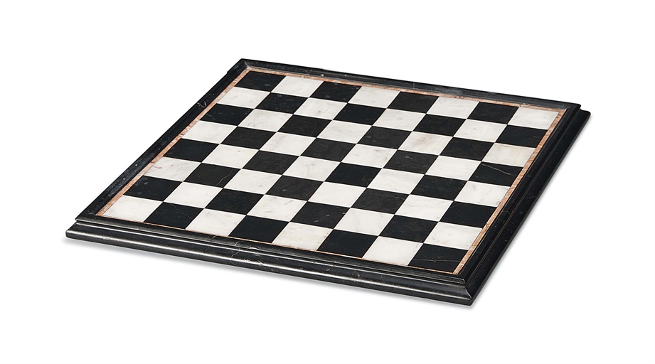 AN ITALIAN MARBLE GAMES BOARD
LATE 19TH CENTURY
With fossil, veined and giallo marble
15¼ x 15¼ (