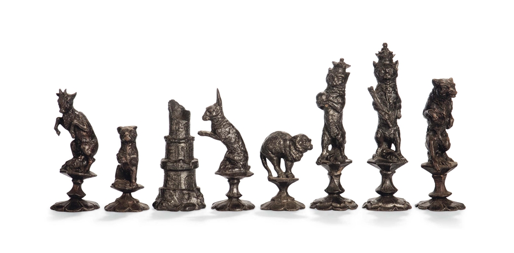 A GERMAN CAST IRON 'REYNARD THE FOX' CHESS SET
HANAU, LATE 19TH / EARLY 20TH CENTURY
The king and