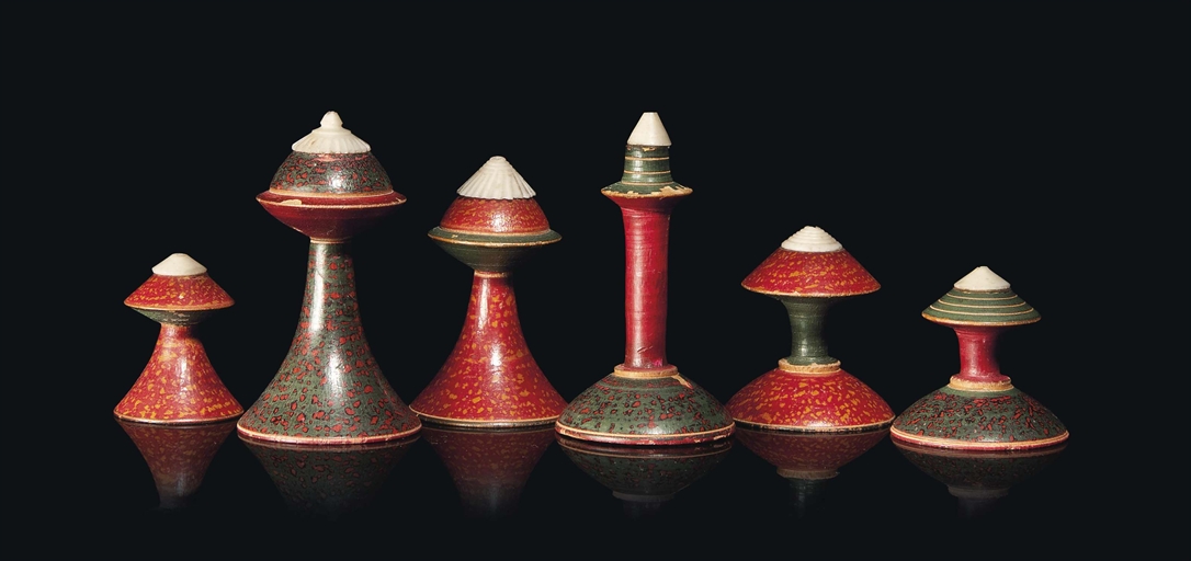 AN INDIAN PAINTED WOOD 'MUSLIM' PATTERN CHESS SET
LATE 19TH / EARLY 20TH CENTURY
Of abstract form