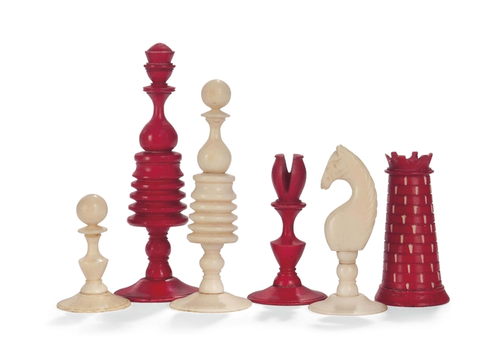 AN ENGLISH IVORY CHESS SET
19TH CENTURY
The kings with geometrical finials and queens with ball knop