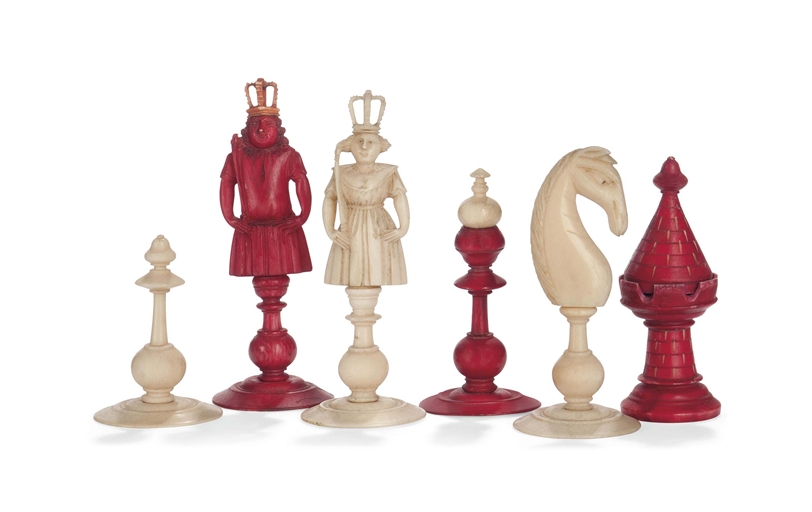 A GERMAN IVORY BUST TYPE CHESS SET
SAXONY, EARLY 19TH CENTURY
The kings and queens modelled in