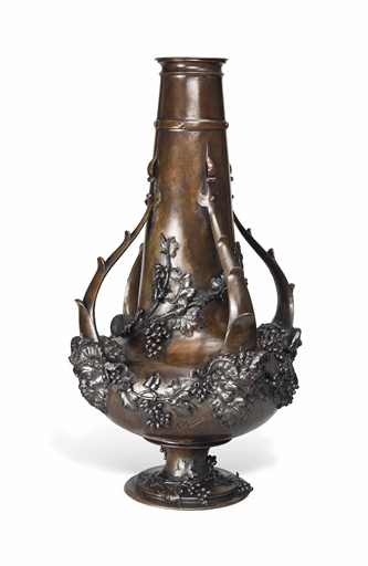 A BELGIAN BRONZE VASE 
CIRCA 1913, CAST FROM A MODEL BY J.H. MOREAU 
The baluster body applied