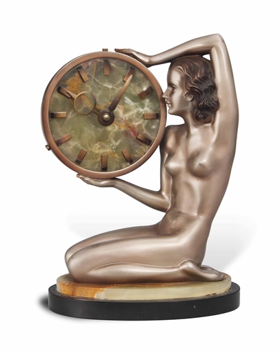 A JOSEF LORENZL (1892-1950) COLD-PAINTED BRONZE AND ONYX TIMEPIECE 
CIRCA 1920 
Modelled and cast as