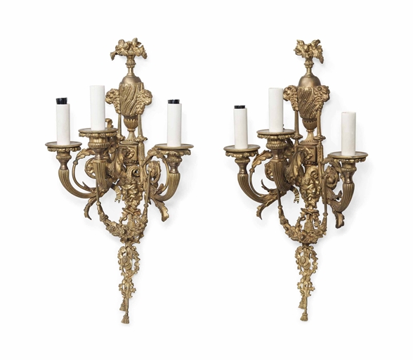 A PAIR OF FRENCH GILT-BRONZE THREE-LIGHT WALL-APPLIQUES 
LATE 19TH CENTURY 
The backplates