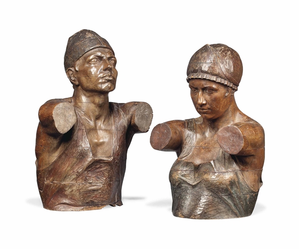 A PAIR OF NORTH ITALIAN CARVED WOOD BUSTS OF A MAN AND A WOMAN 
CIRCA 1920 
Of sectional