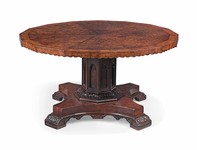 AN OAK AND BURR OAK CENTER TABLE 
THIRD QUARTER 19TH CENTURY 
With a radially veneered tilt top, the